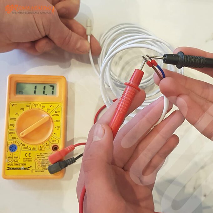 Multimeter testing thermostat floor probe